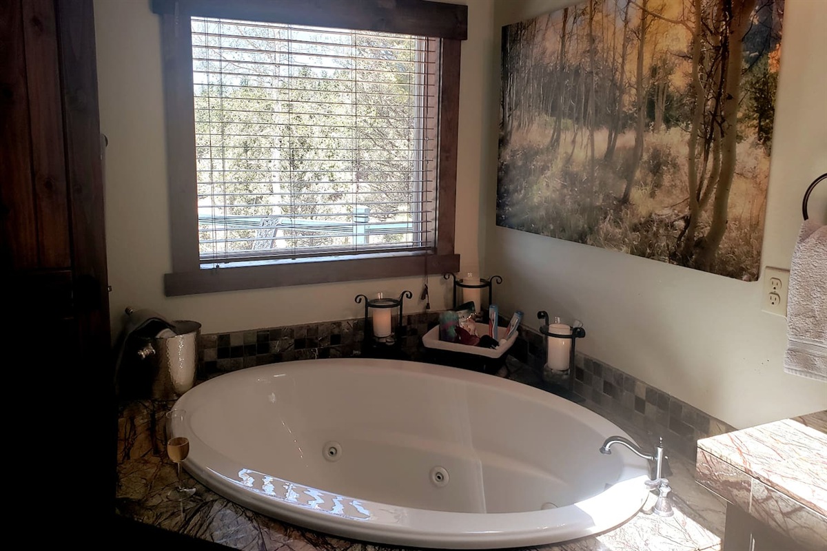 Set the tone for the evening in the Jacuzzi jetted garden tub