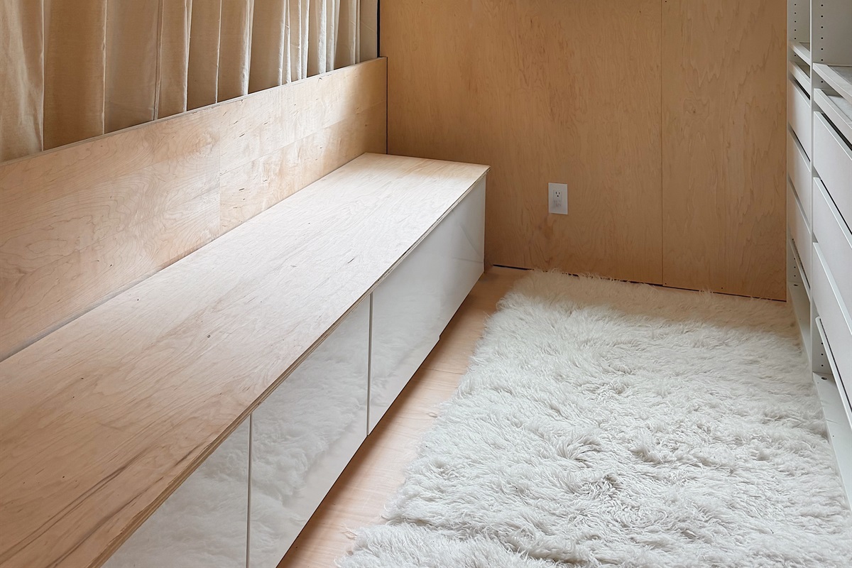 The extensive open closet area upstairs.