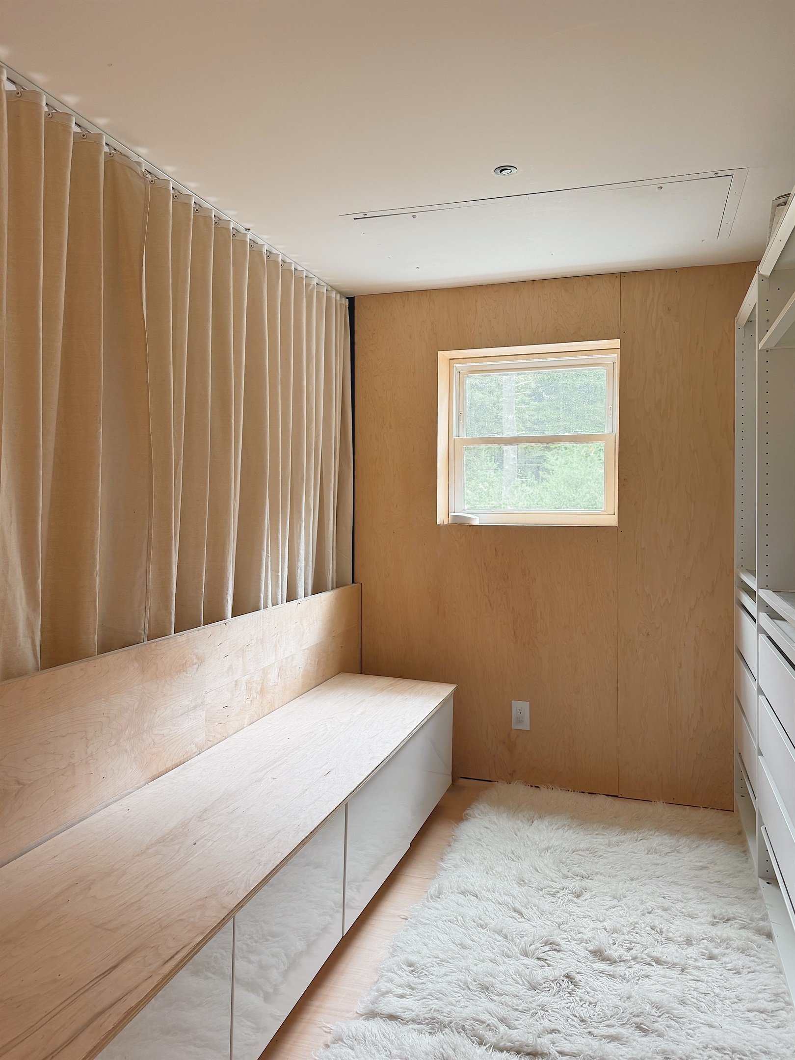 The extensive open closet area upstairs.