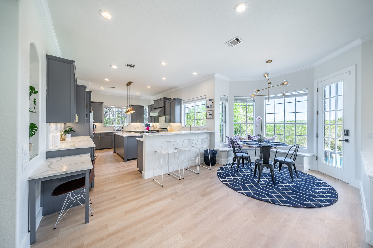 Open-concept dining area flows seamlessly into the chef-ready kitchen.