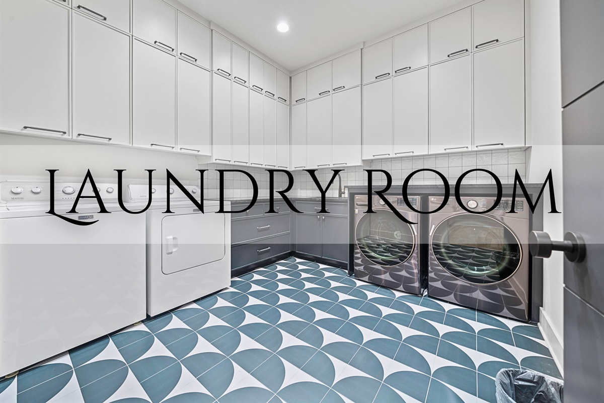 Enjoy the convenience and style of this well-designed laundry room, complete with ample storage and modern fixtures.
