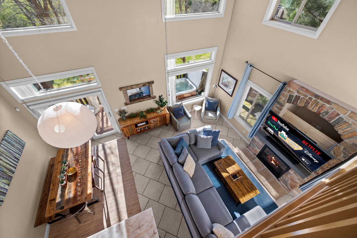 Dramatic overhead perspective showcasing the home’s spacious open-concept layout and vaulted ceilings.