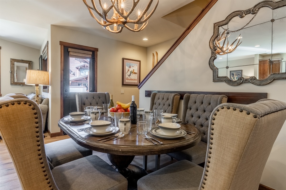 The spacious dining table at Mountainside #6 is perfect for shared meals, planning the day’s adventures, or lingering over coffee in the morning light.