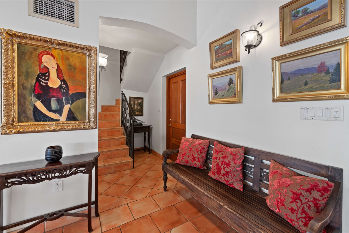 Step outside of the second main house king suite and you'll find the stairs that lead up to the game room.