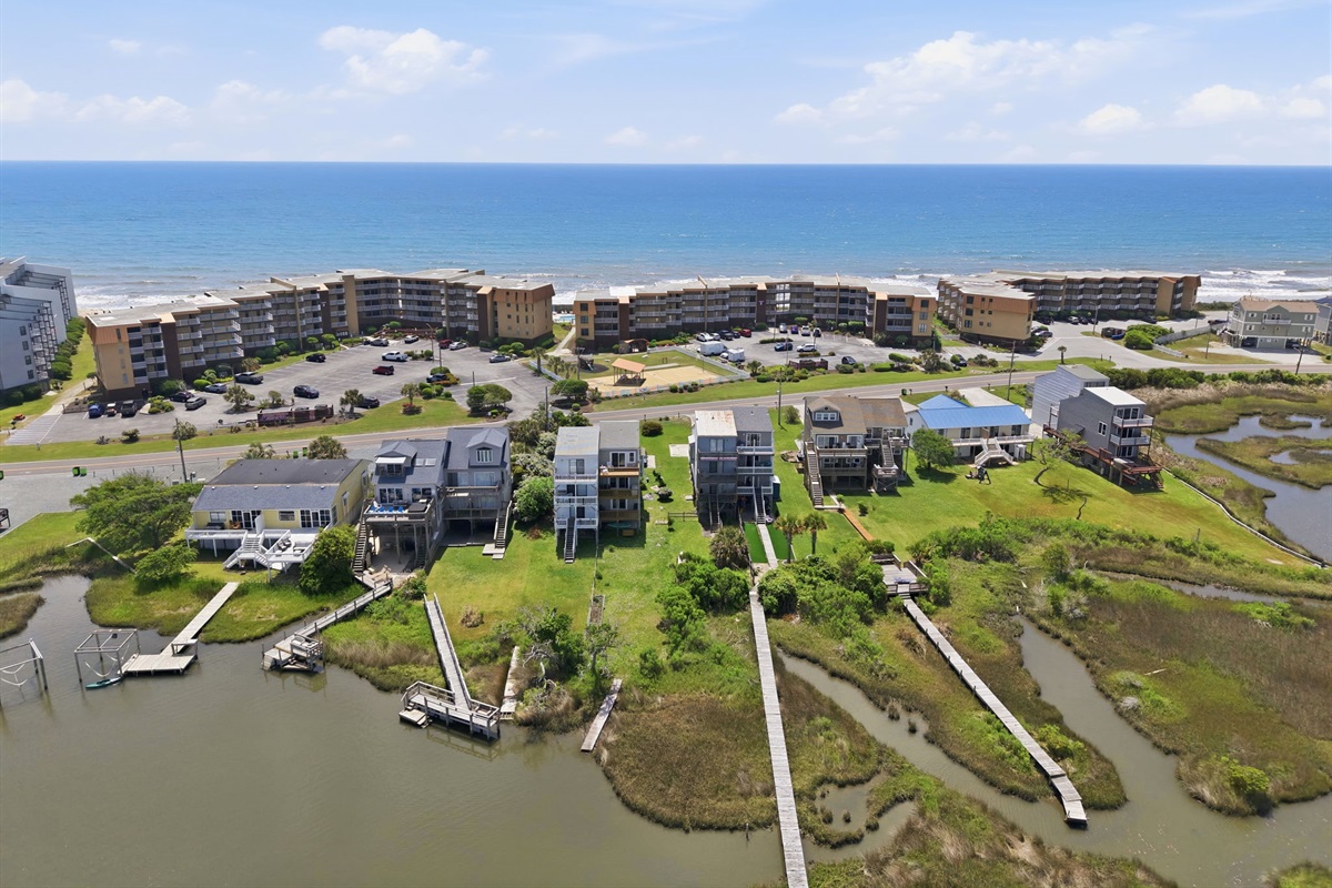 Unique coastal setting with sound-side homes, marsh views, and the beach just across the road
