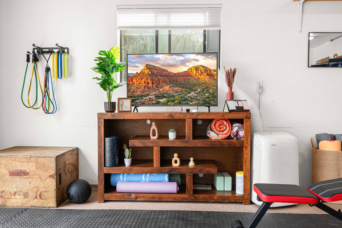{Fitness Studio} Keep up your routine with dedicated workout equipment conveniently located in the garage gym including a rower, bench, and 15-50 lb dumbbells.