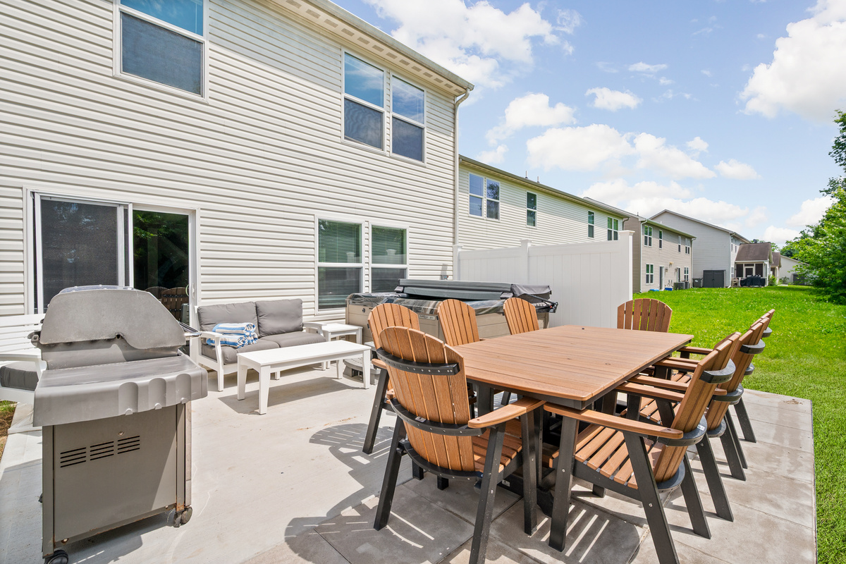 Gather the whole group for a meal outdoors at our spacious dining table with seating for up to 8 guests.