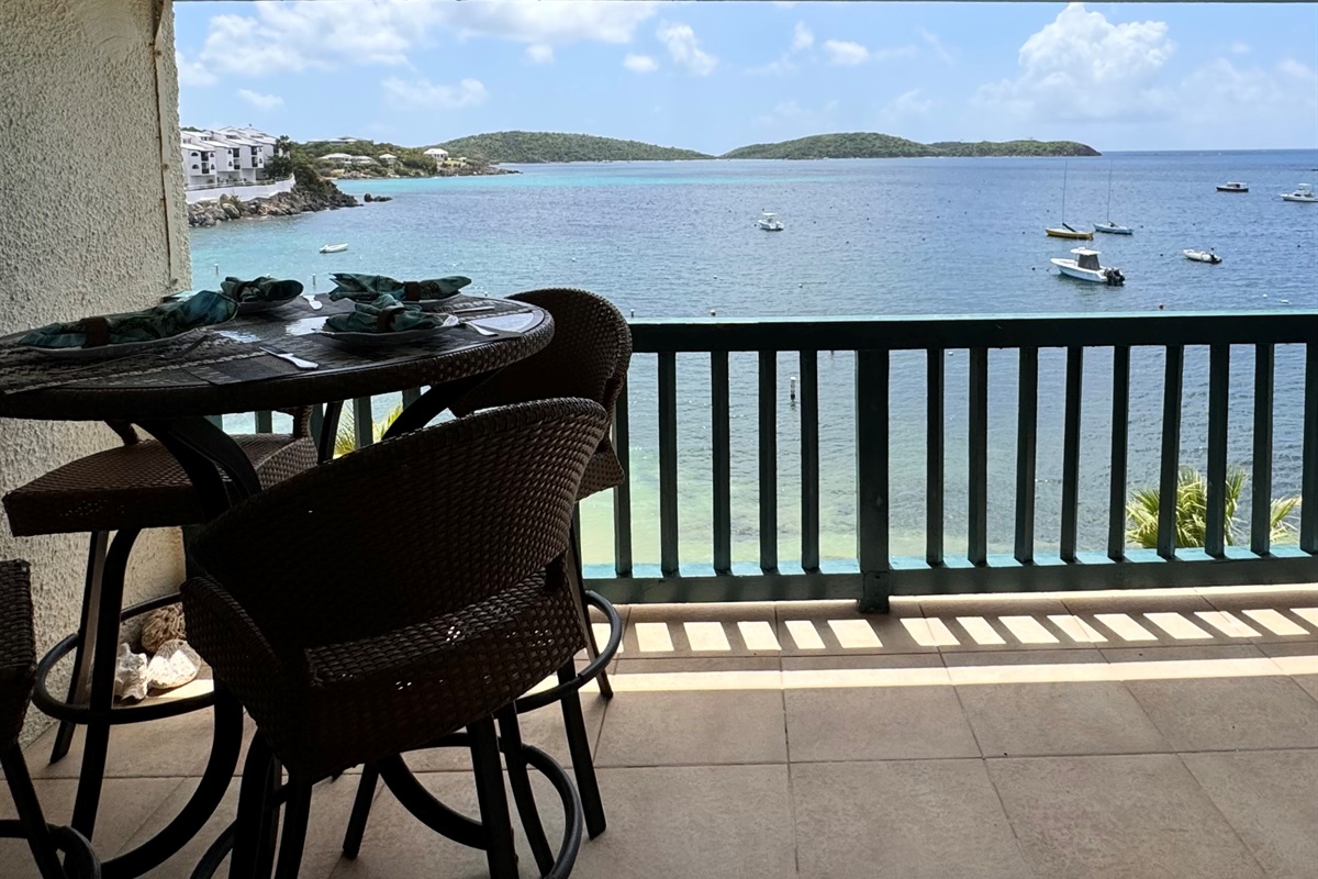 The oceanfront patio overlooking Cowpet Bay and the Yacht Club