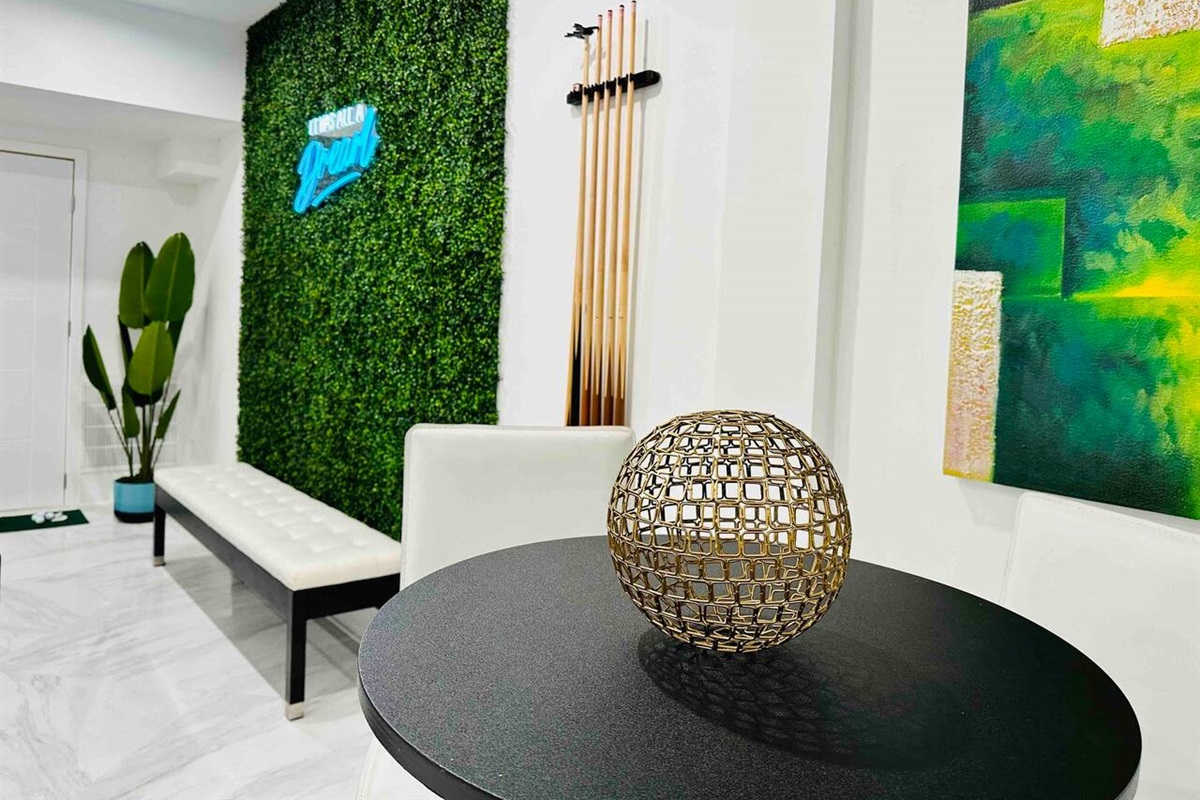Enjoy a cocktail in our masterfully designed home. Art is everywhere.