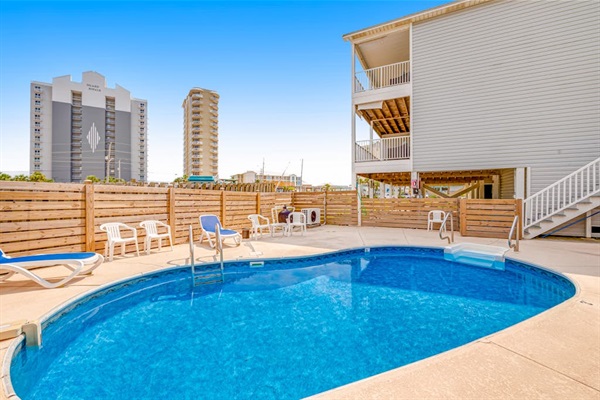 Our heated pool. The decks you see are ours and overlook pool and cove