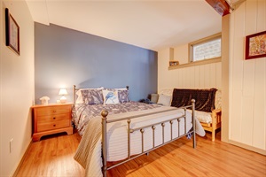 Queen bedroom with couch