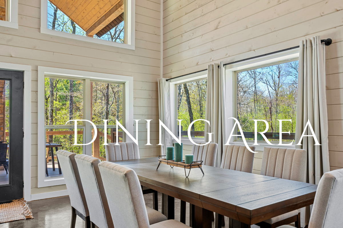 Gather around our inviting dining area, where a sturdy wooden table and comfortable seating await for intimate meals
