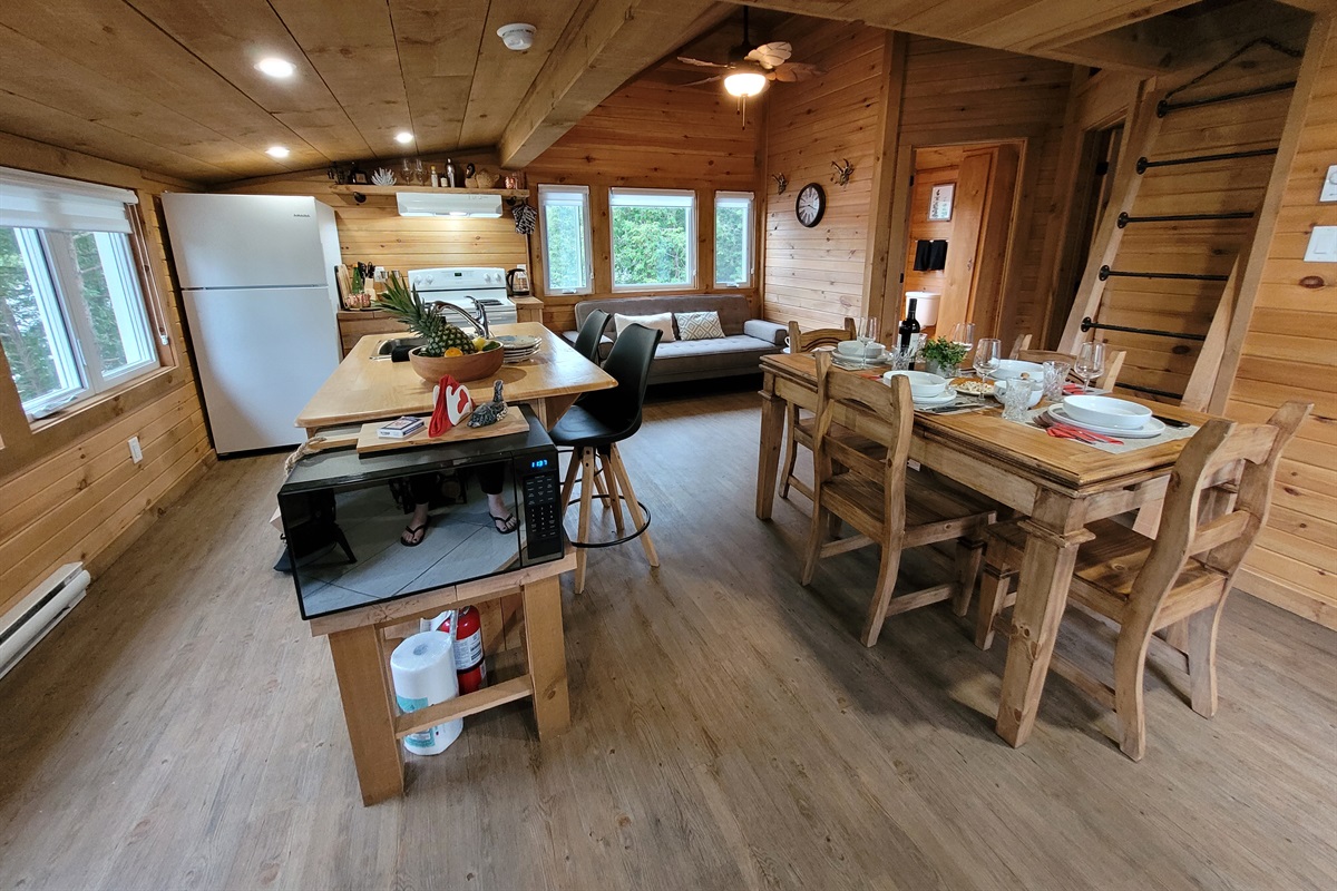 View of dining area and into kitchen and seating