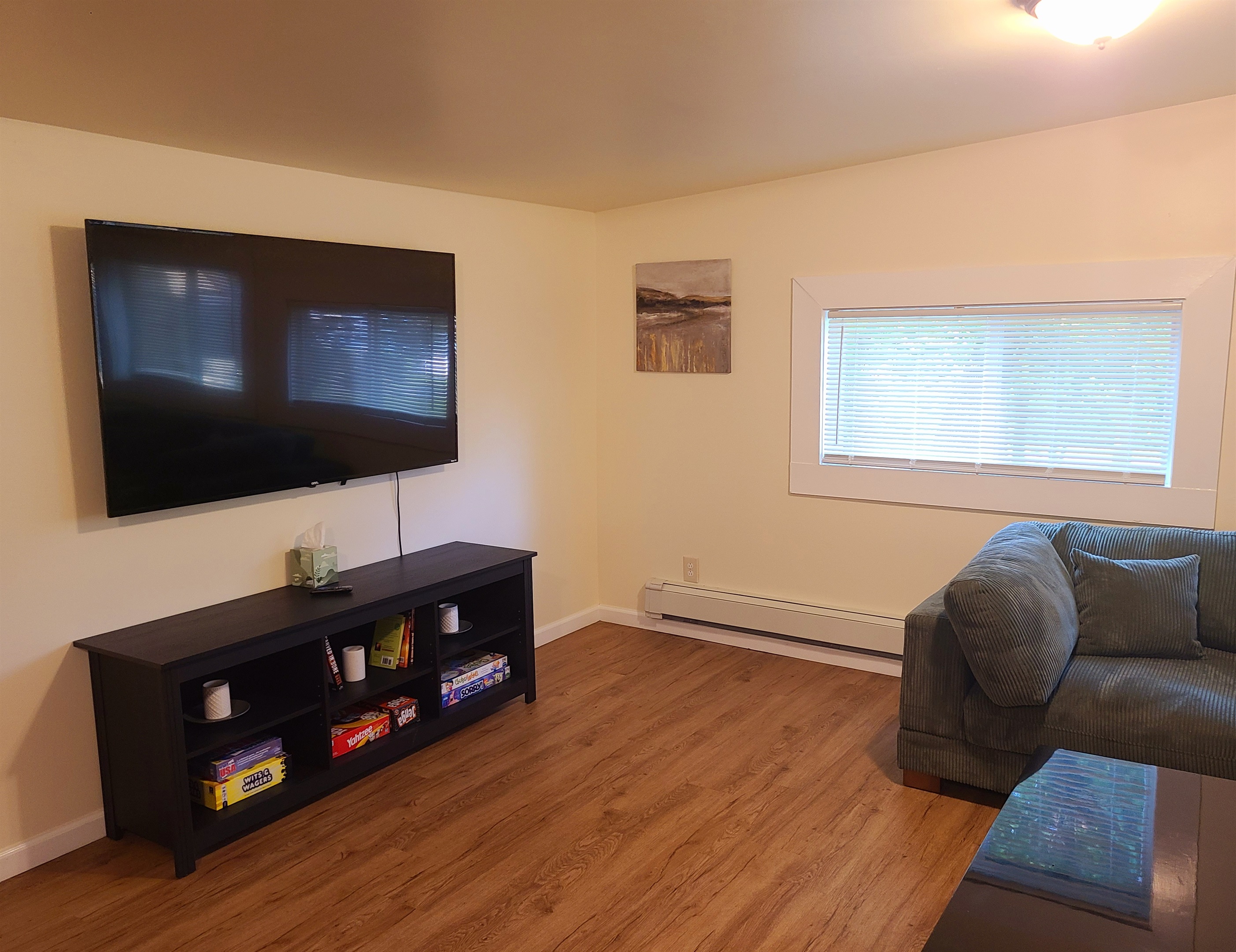 Large sectional in living room with SmartTV