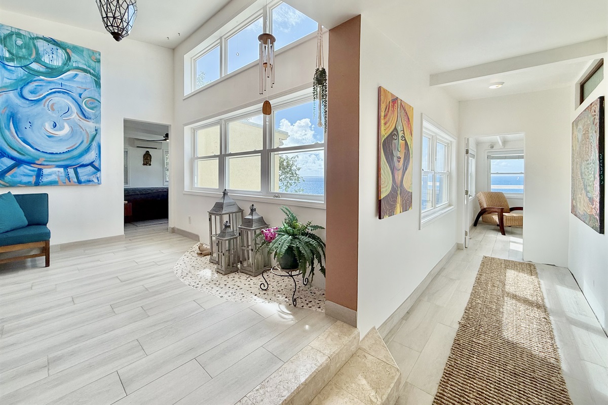 When you exit the queen bedroom and head right, you will enter the primary suite.