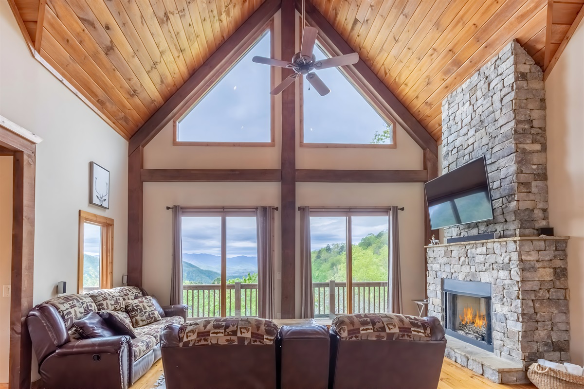 The main floor living room is spacious with plenty of windows to let in the natural light and take in the views.