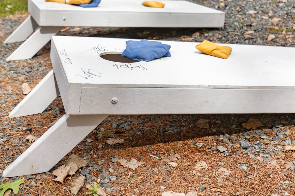 Kick back and enjoy a friendly game of cornhole in the yard—perfect for laughter-filled afternoons and making memories together.
