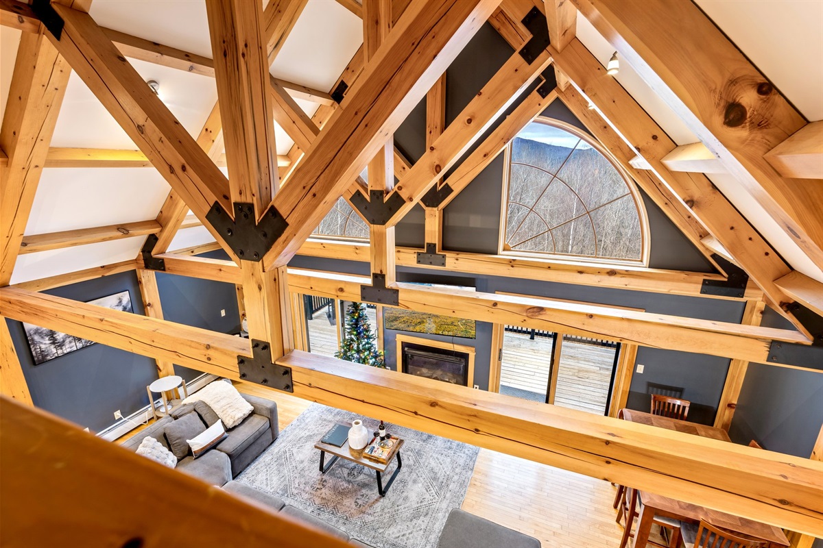 Admire the striking vaulted architecture that fills the living space with light, warmth, and the wow factor the moment you arrive.