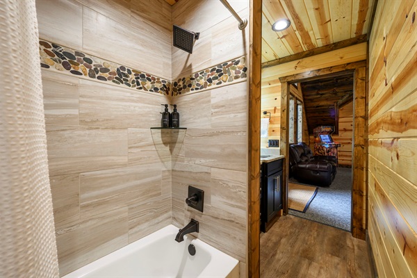 Bright, modern, and refreshing—this ensuite bathroom features a spacious walk-in shower, sleek finishes, and everything you need to unwind in comfort