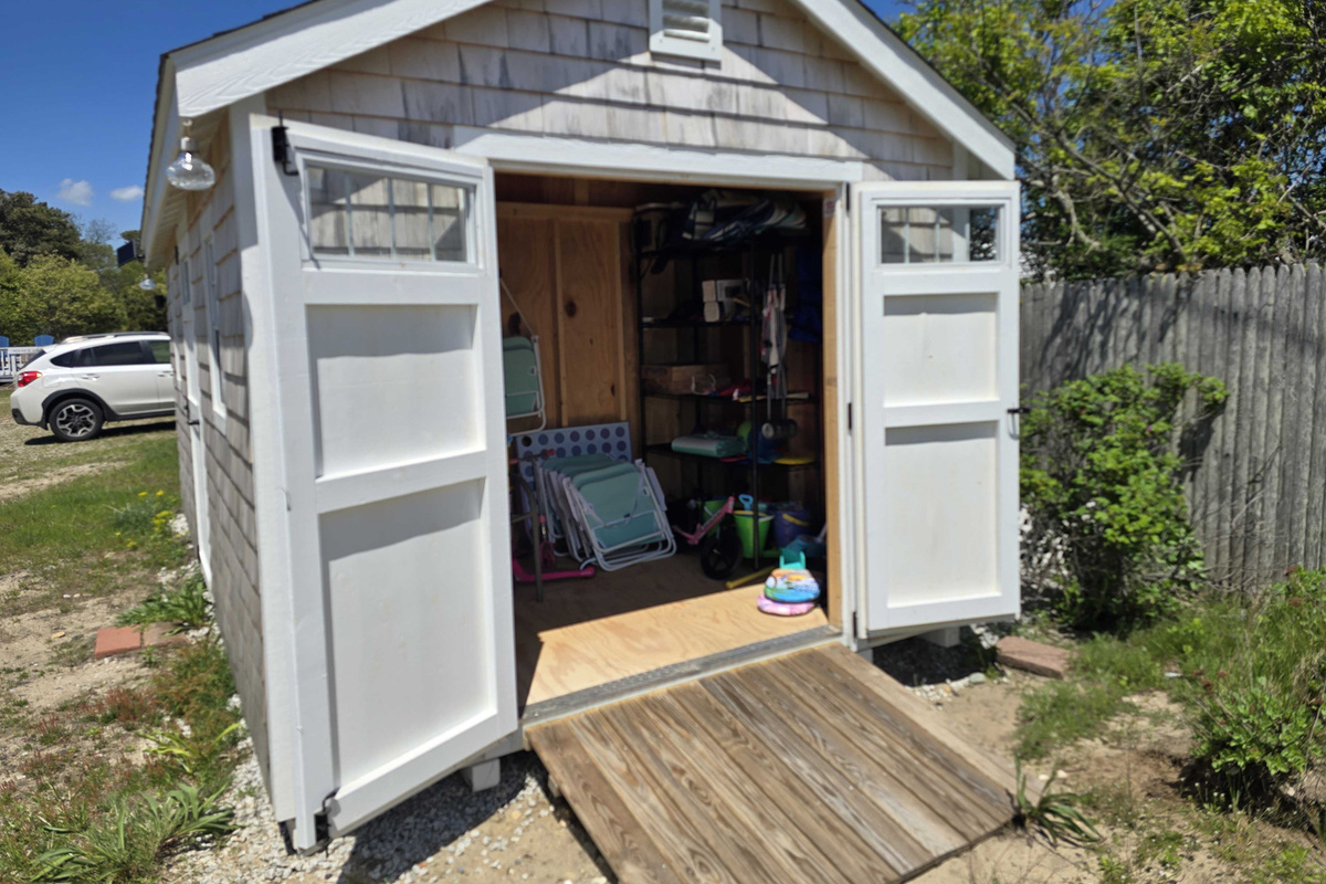 The shed is fully stocked with beach essentials for your convenience.