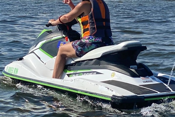 Cruising the bay on wave runners, looking for dolphin and chilling at crab island