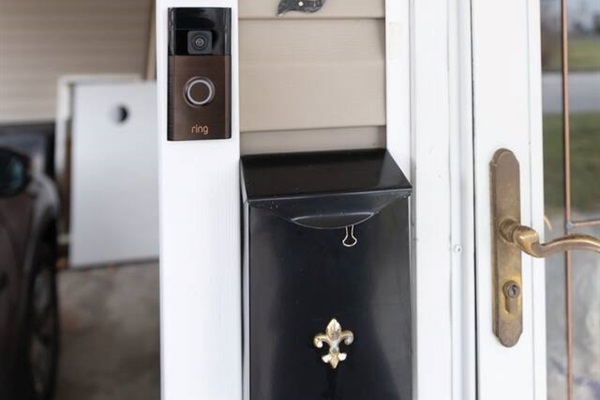 Video doorbell at front entry.