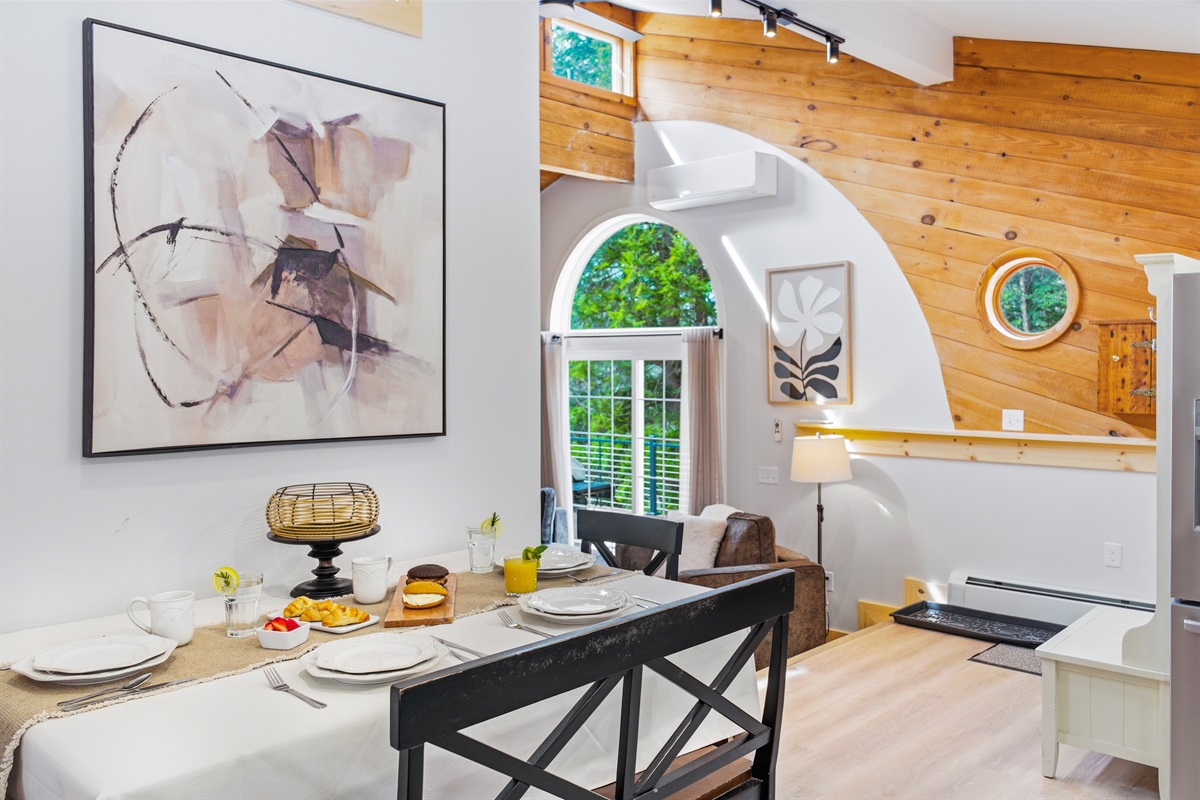 Enjoy a quiet brunch or a cozy dinner for two in this bright, intimate corner just off the kitchen.