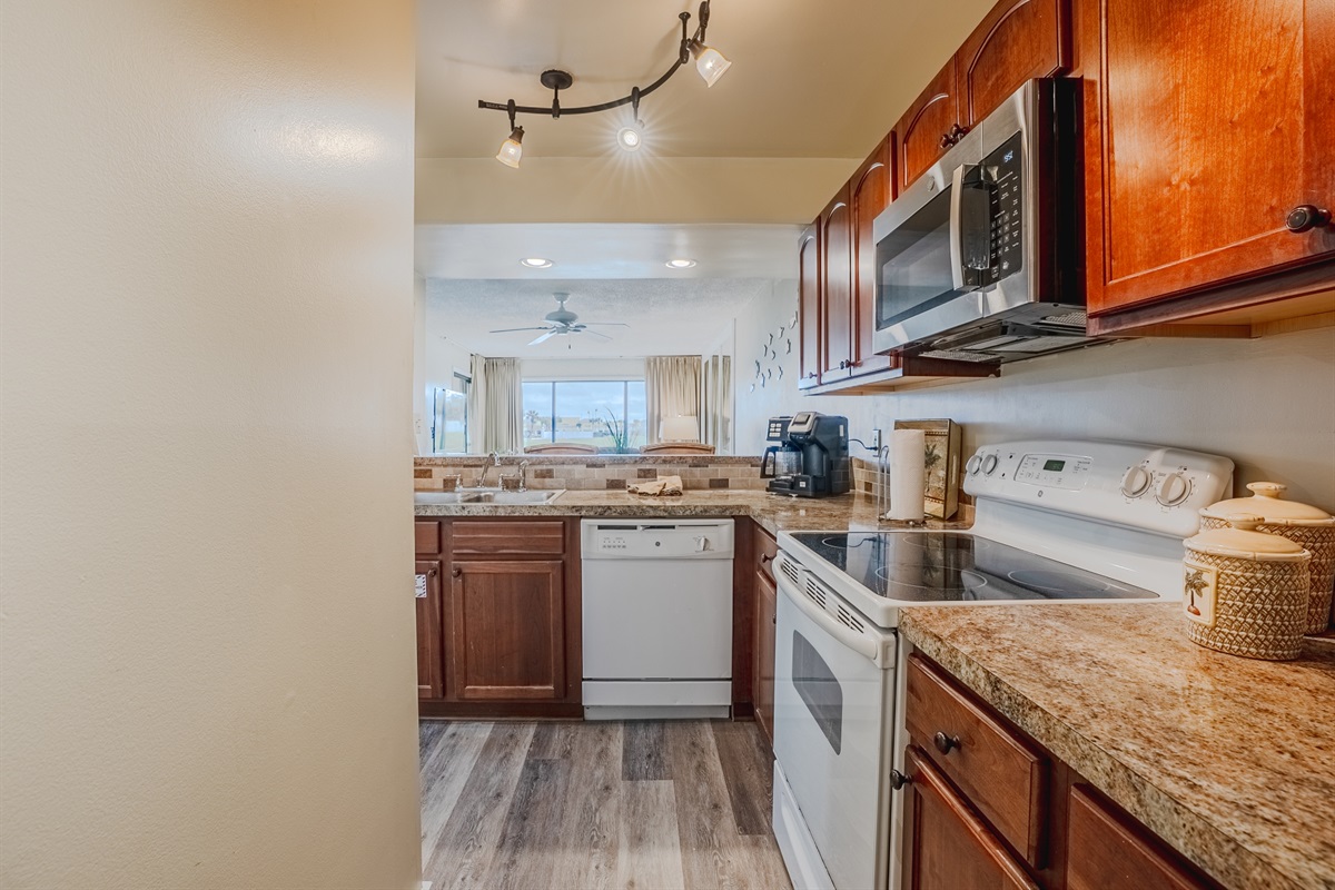 Full kitchen well equipped with appliances large and small