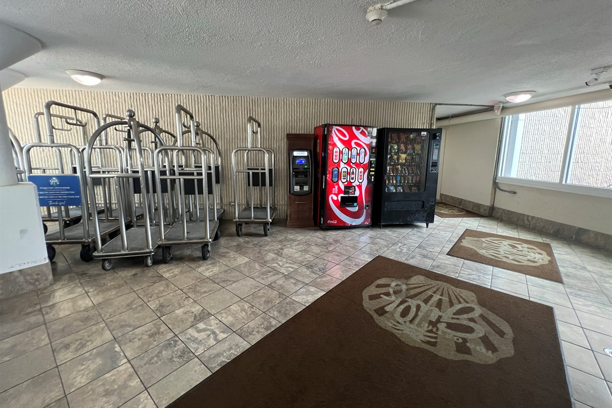 Lobby Area with luggage carts and vending machines