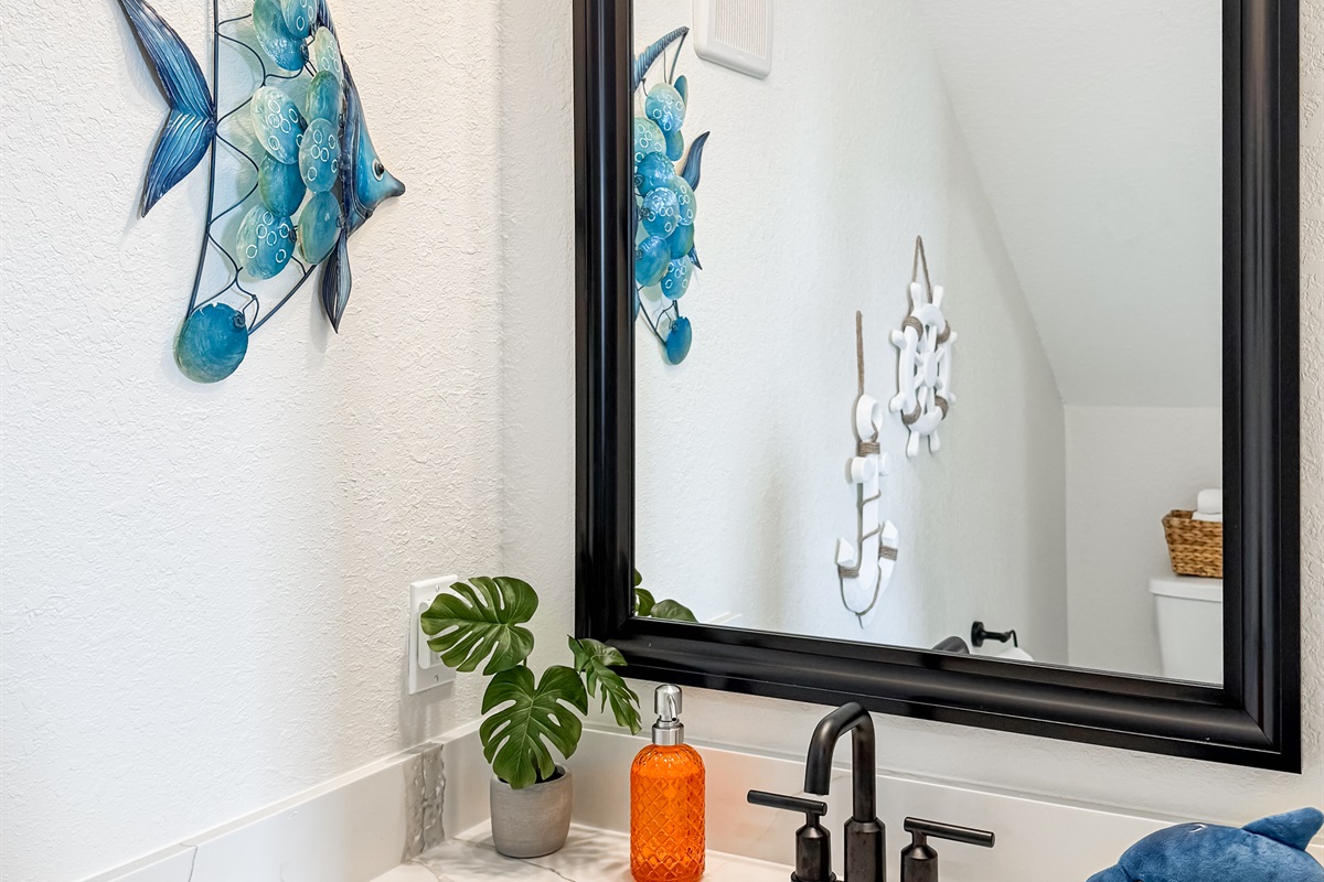 There&rsquo;s a shared half bath in the main living area.