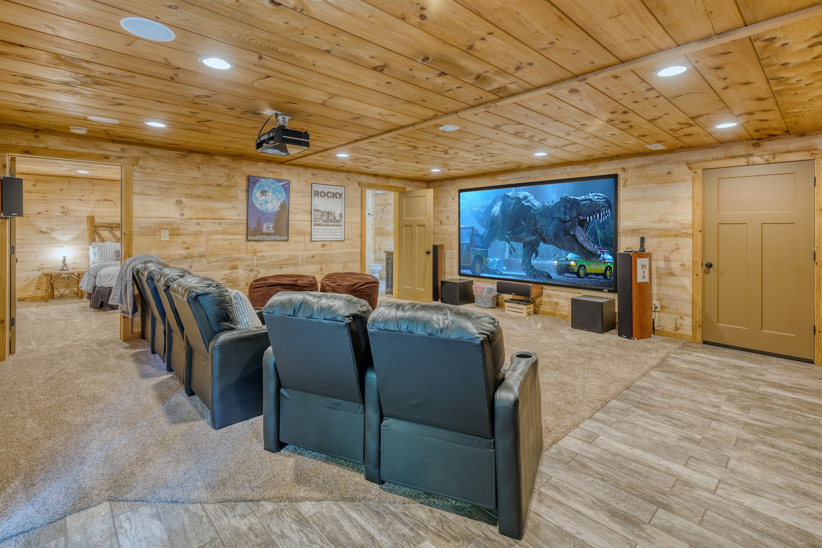 100” screen with premium sound sytem and comfy theater seats.