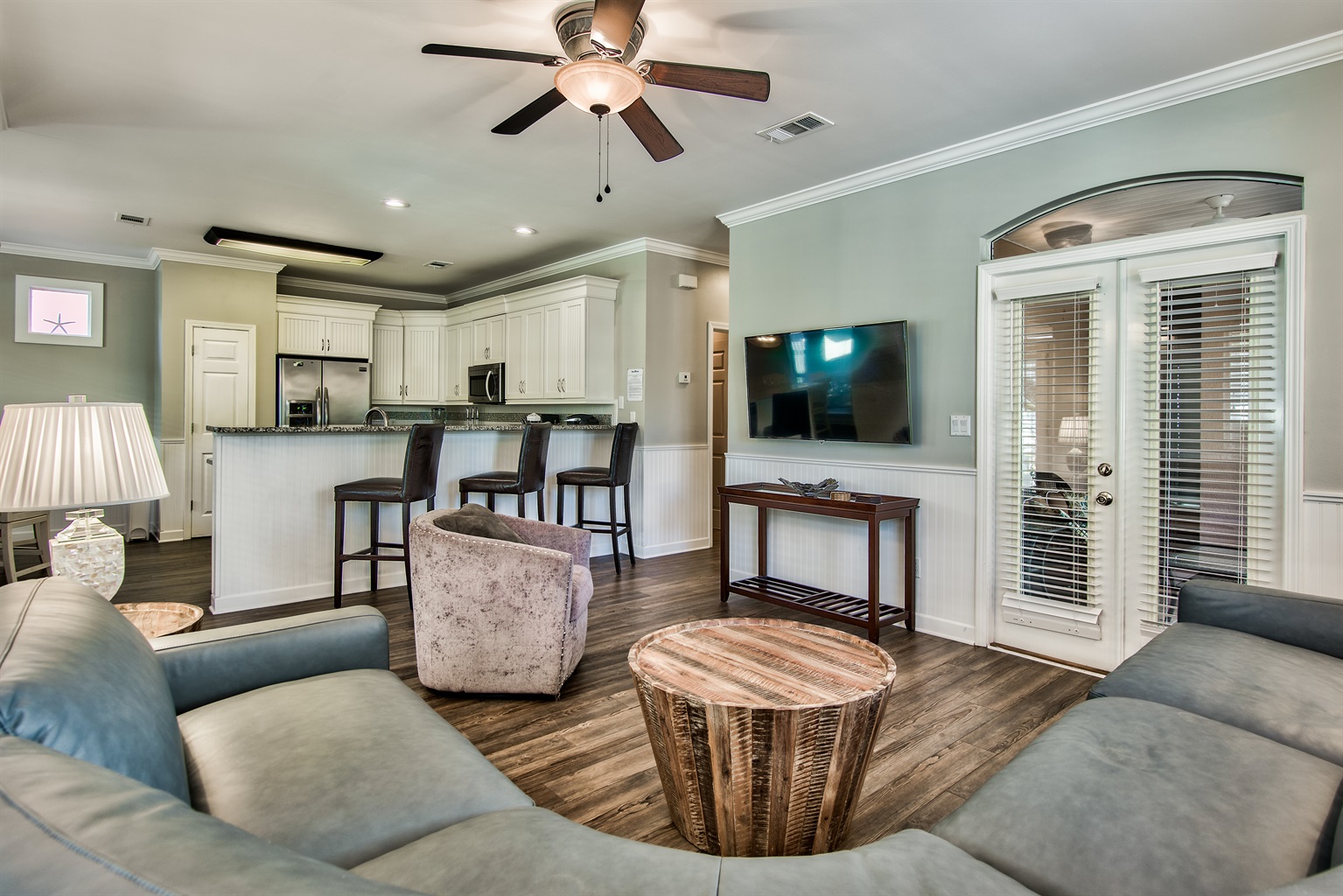 Spacious living room with direct access to the screened porch