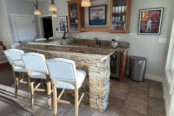 Gather around the bar, catch the game, and enjoy views of Norris Lake