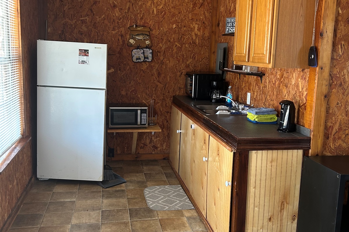 Small Kitchen fully stocked with all your cooking need