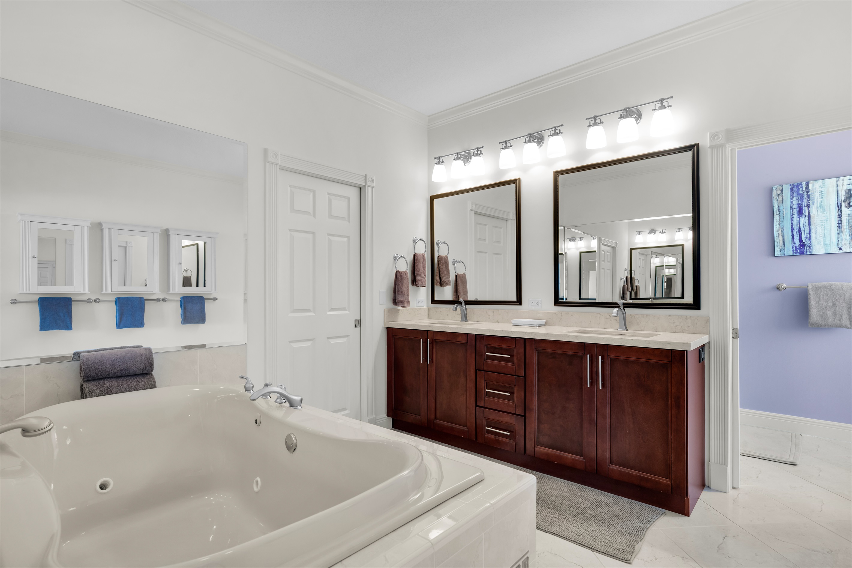 Primary ensuite bathroom with double vanity