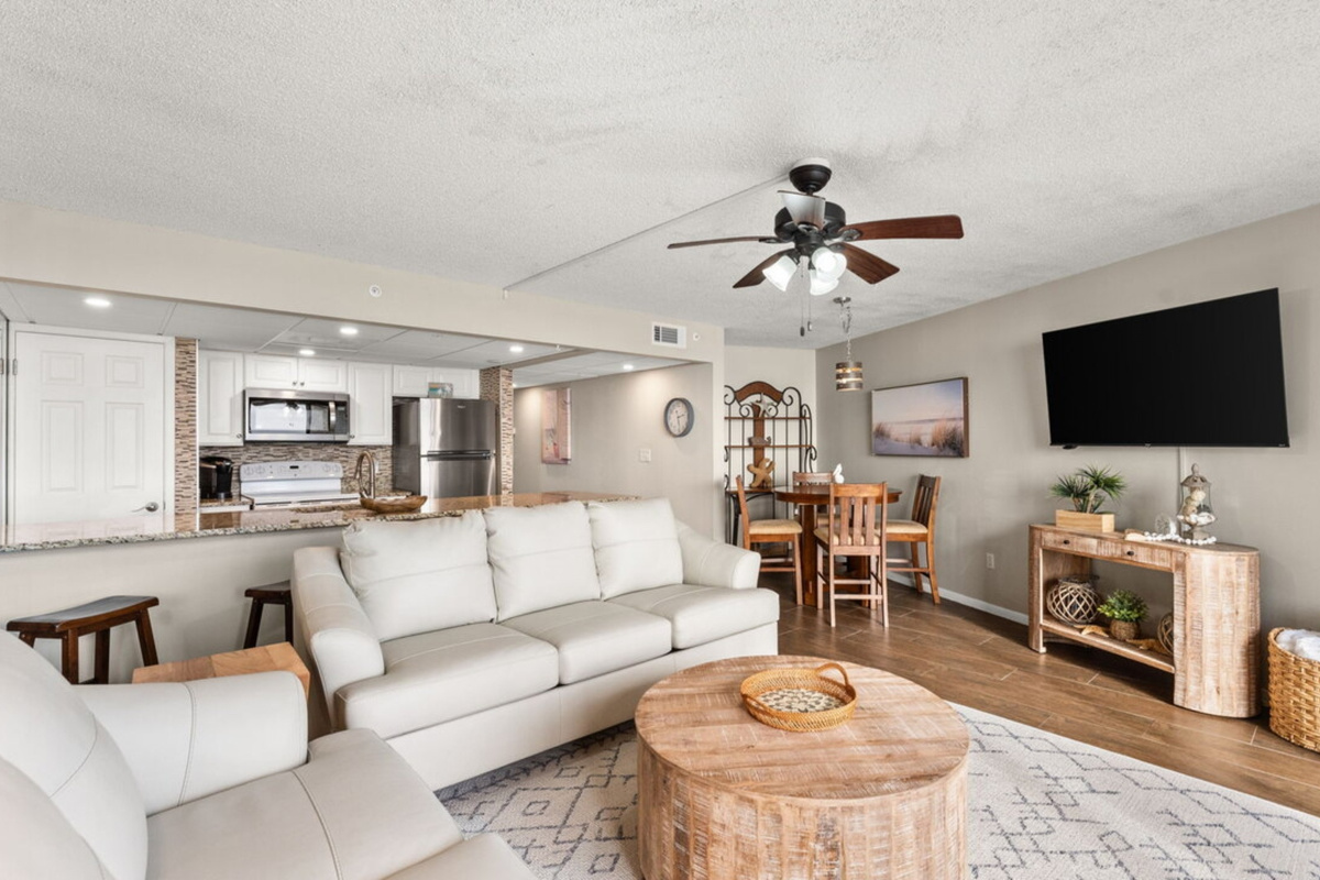 Comfy living room with private balcony, smart TV