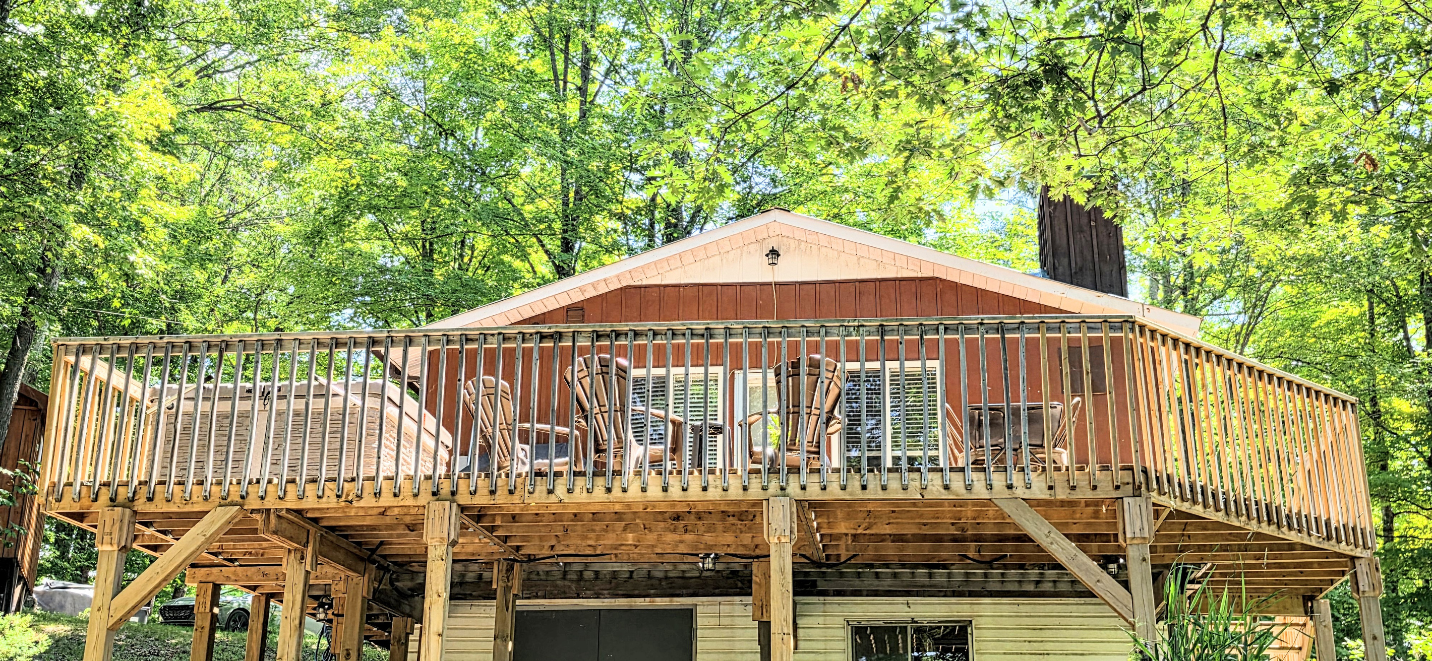 Balcony seen from below near fire pit area