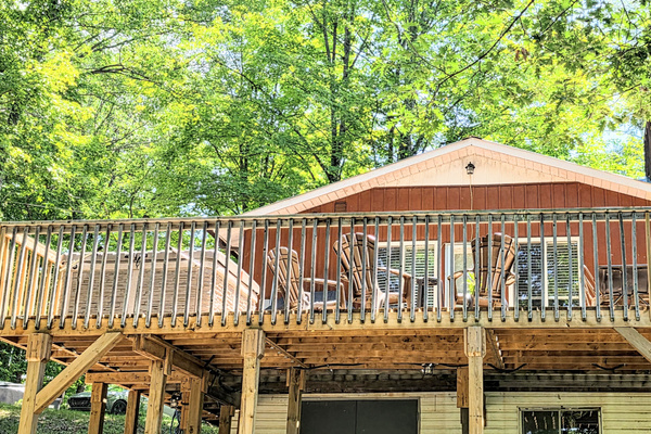 Balcony seen from below near fire pit area