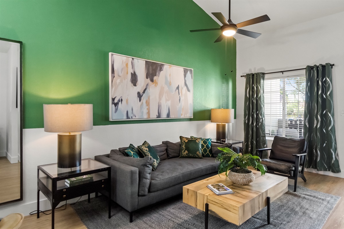 Relax in a cozy living room with a Smart TV and fast Wi-Fi.
