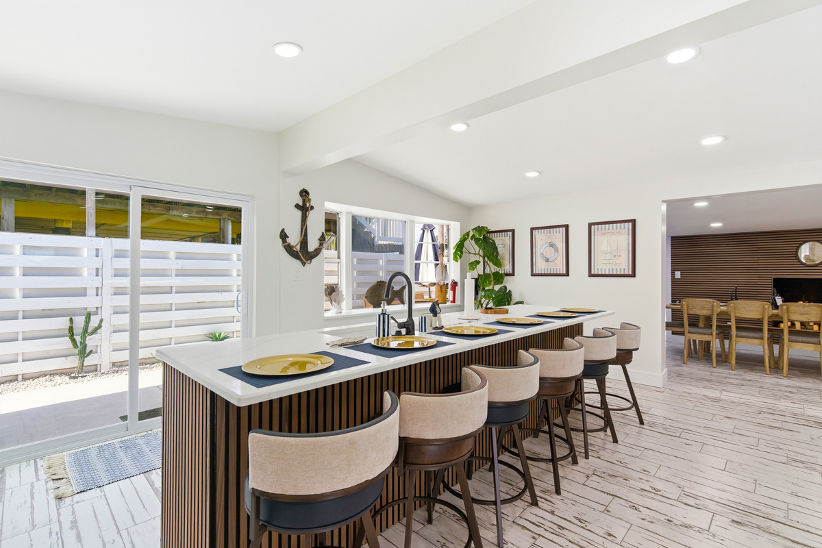 Fully stocked kitchen that opens up to the living room 