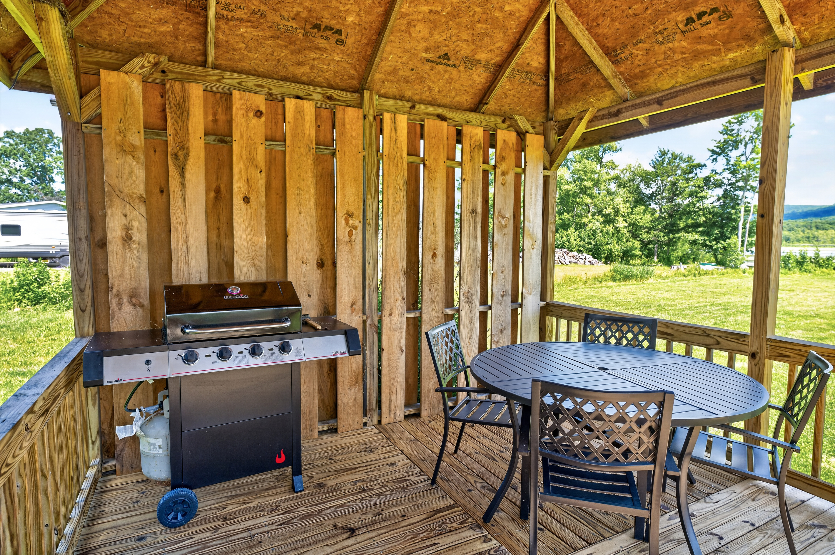 Covered deck with grill and dining table
