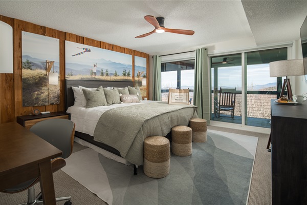 Summer Kites Bedroom: Relax with breathtaking views, luxury king bed, 55' Roku TV, work desk, access to the lower deck. Extra twin mattress can be pulled out from under king. A perfect balance of comfort and functionality.