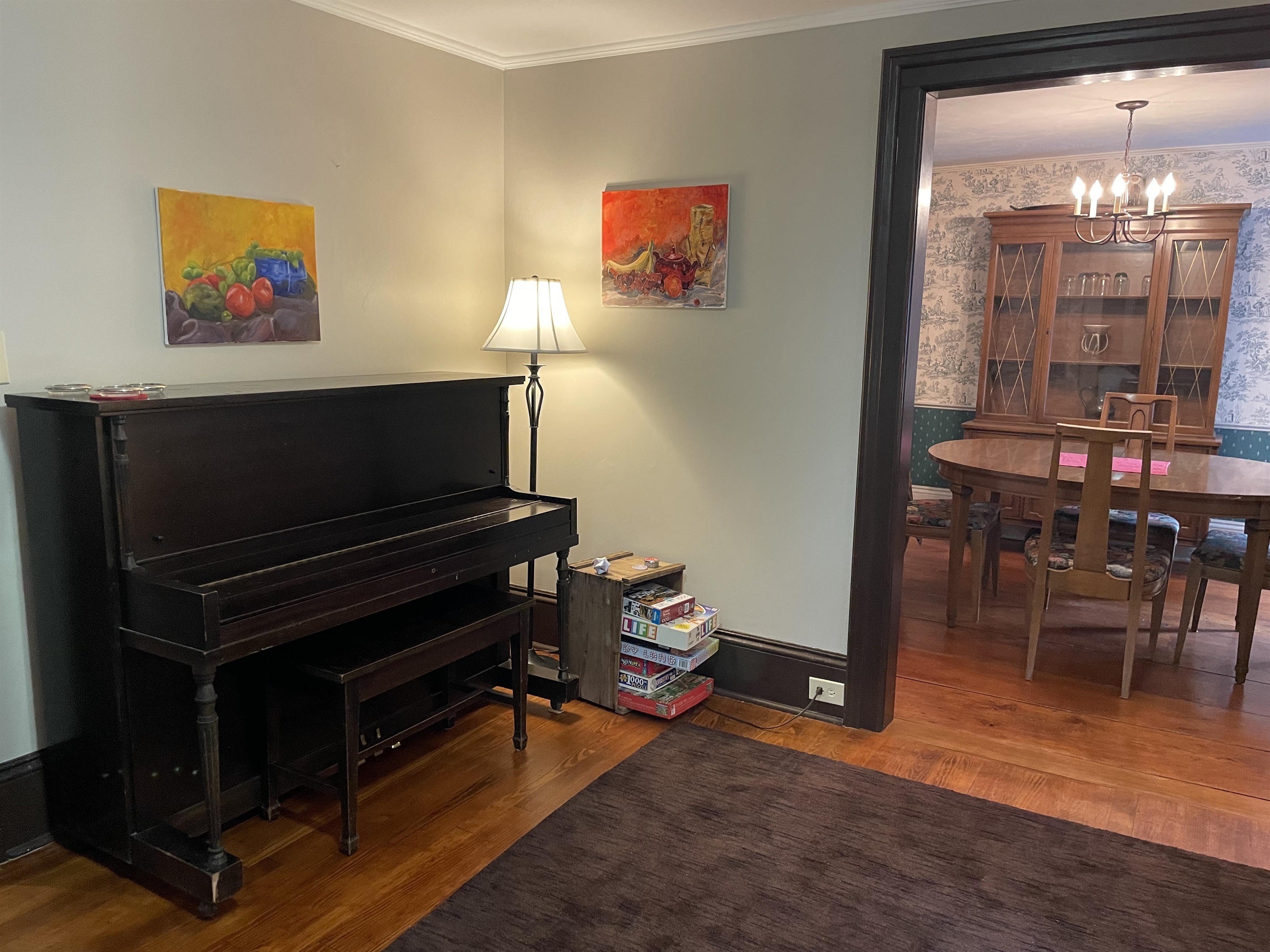 Piano and board games in family room