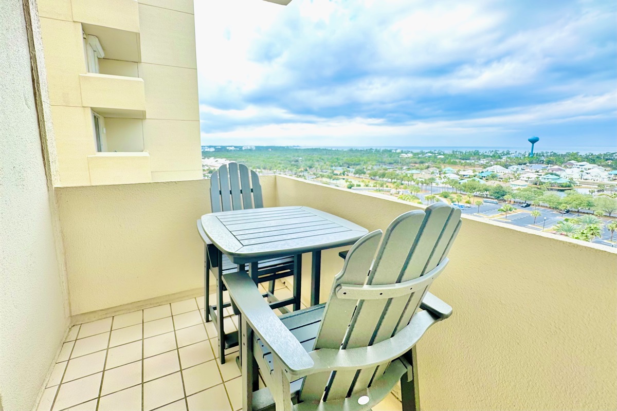 Enjoy views of the Mobile Bay and Beach Club grounds from this private balcony