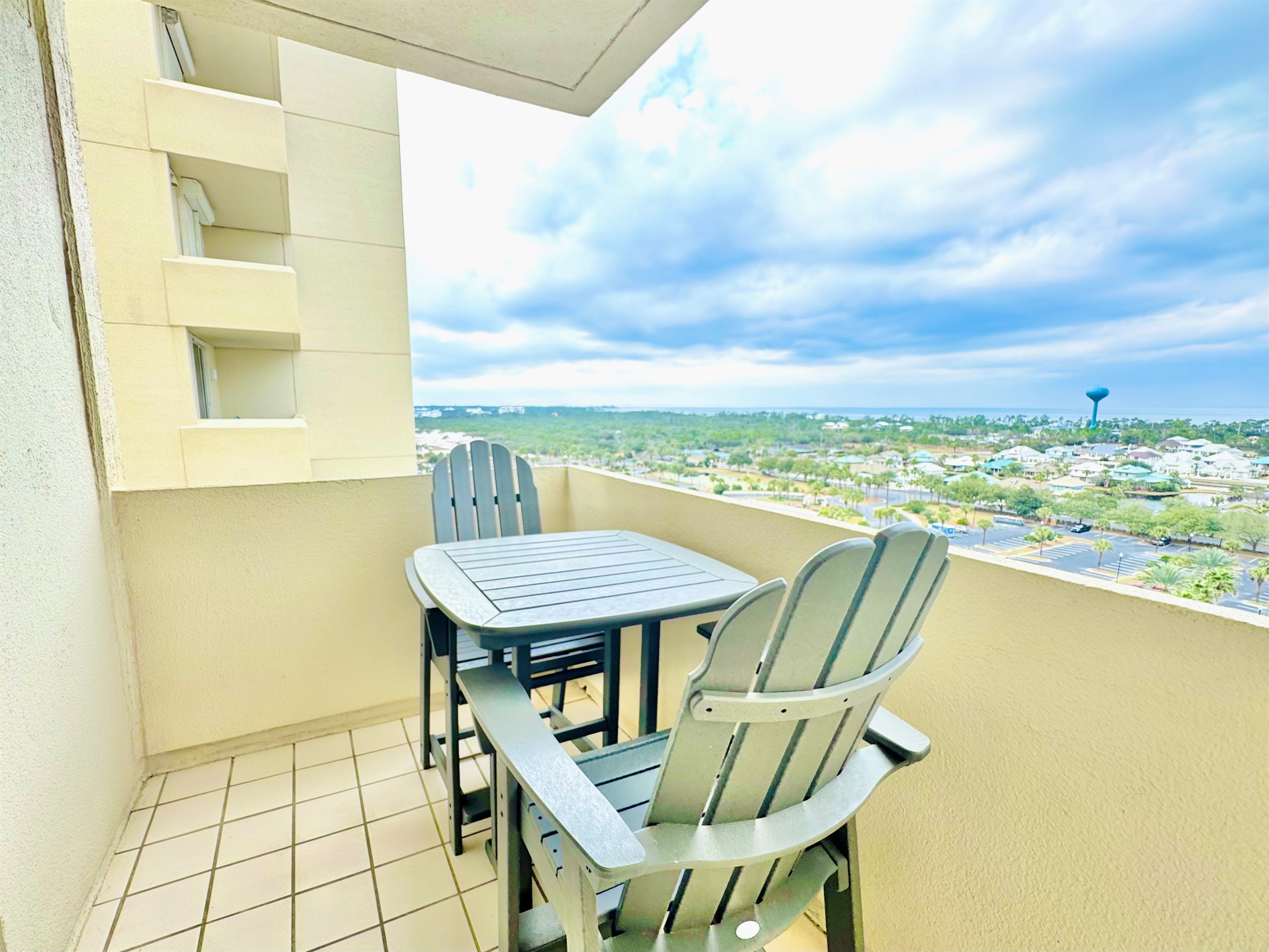Enjoy views of the Mobile Bay and Beach Club grounds from this private balcony