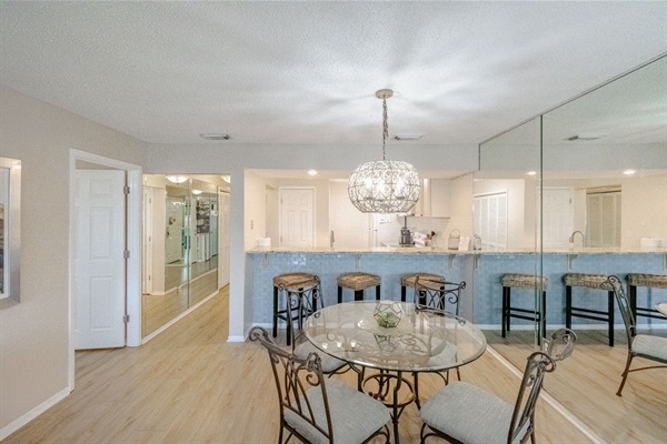 Dining table looking into the kitchen