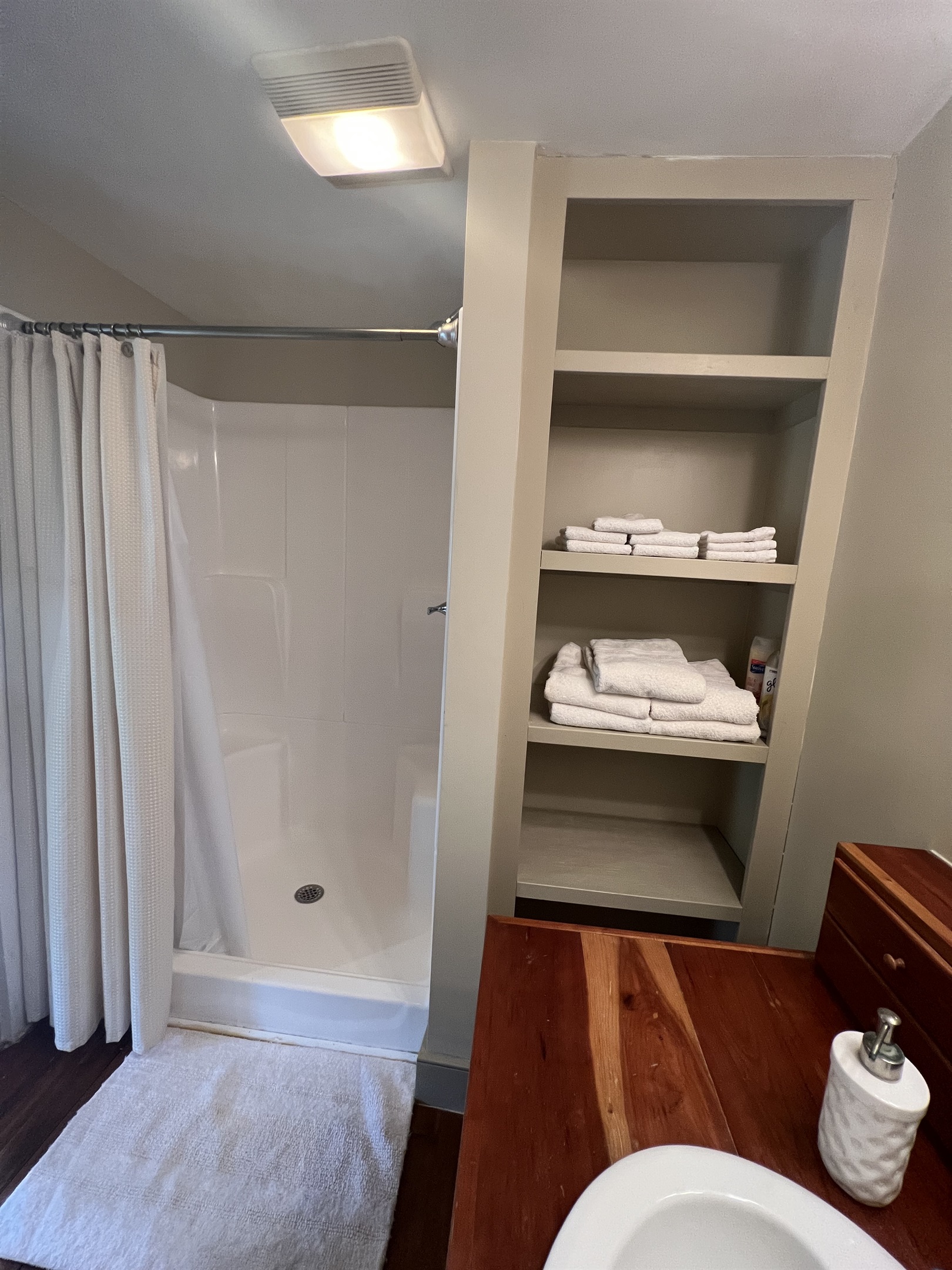 Ensuite bath with shower in family suite