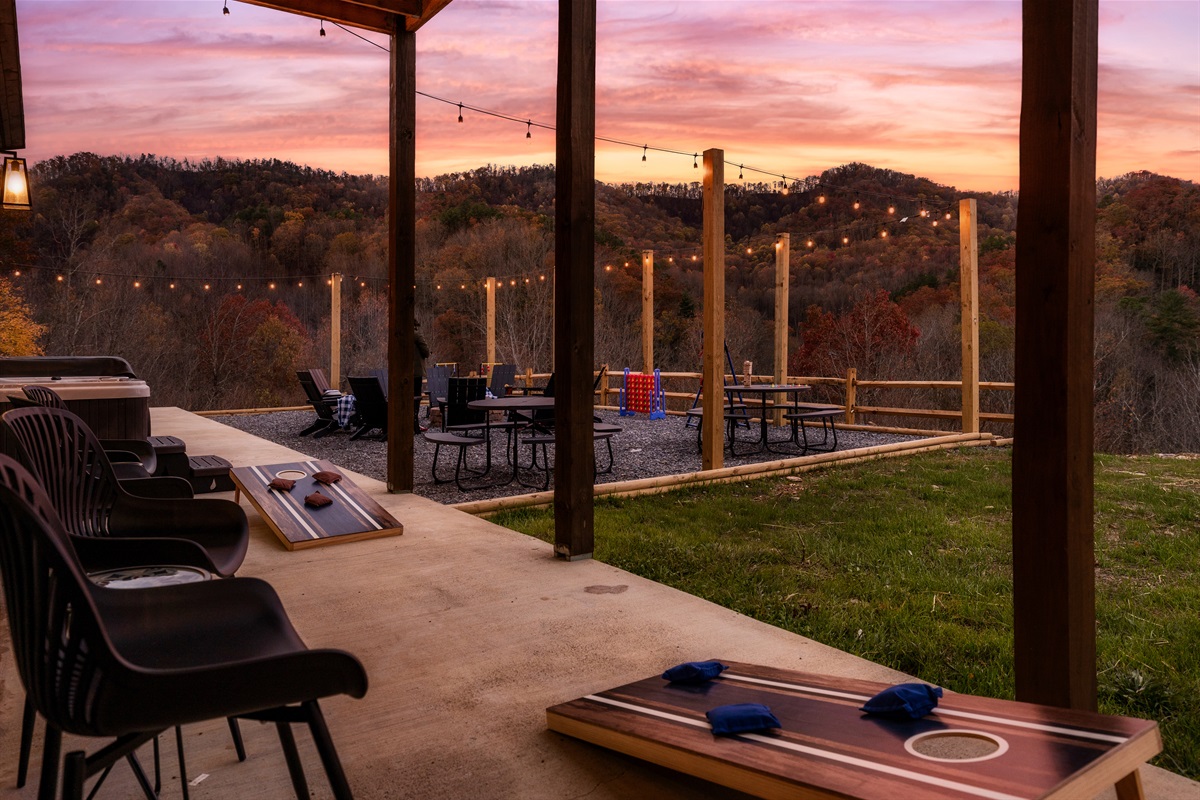 Fire Pit in backyard with picnic tables & views