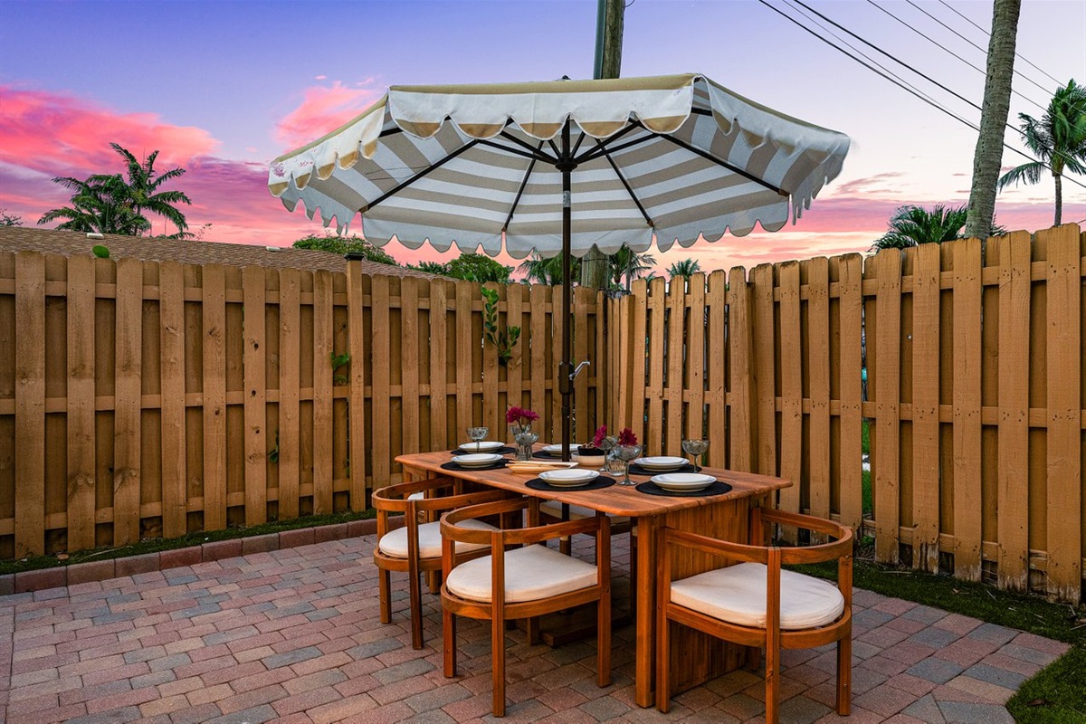 Dine under the stars in a tropical retreat with a stunning sunset backdrop!