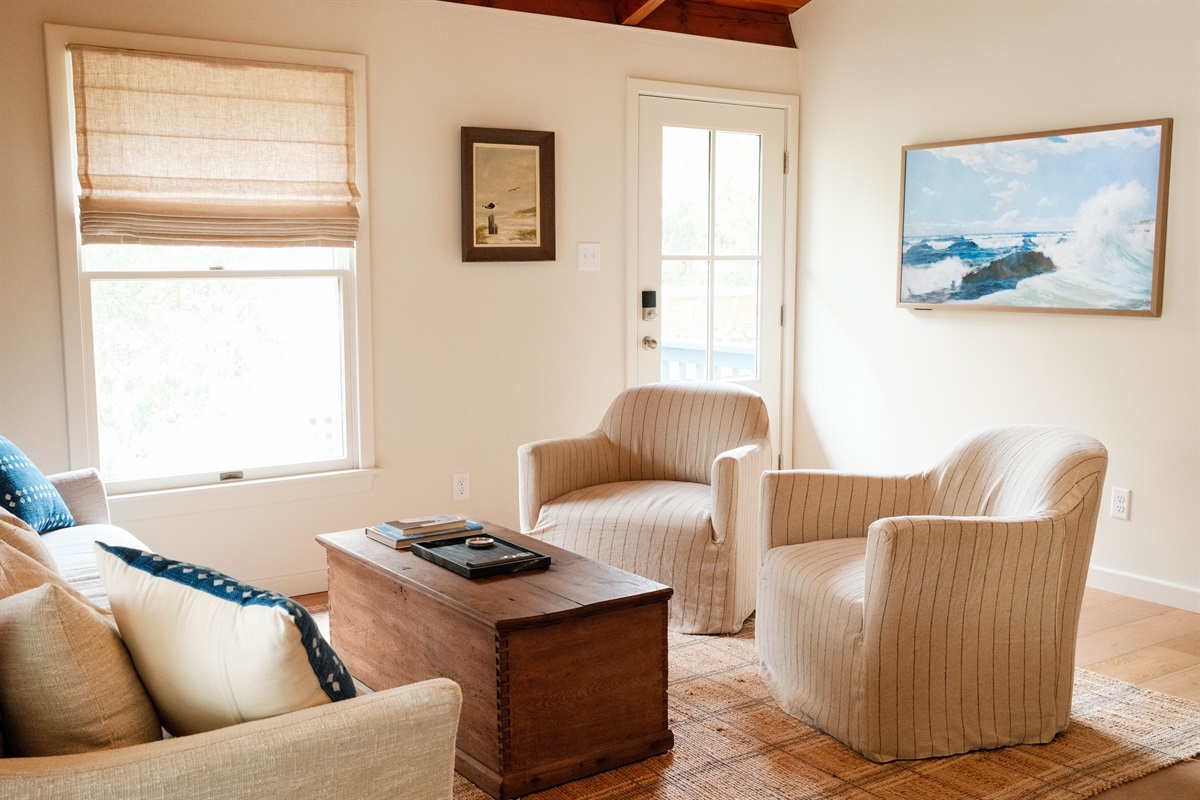 Living Room with FrameTV, Rowe Furniture Couch and Amber Lewis Chairs